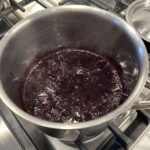 simmering blueberries for coffee syrup