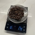weighing espresso beans